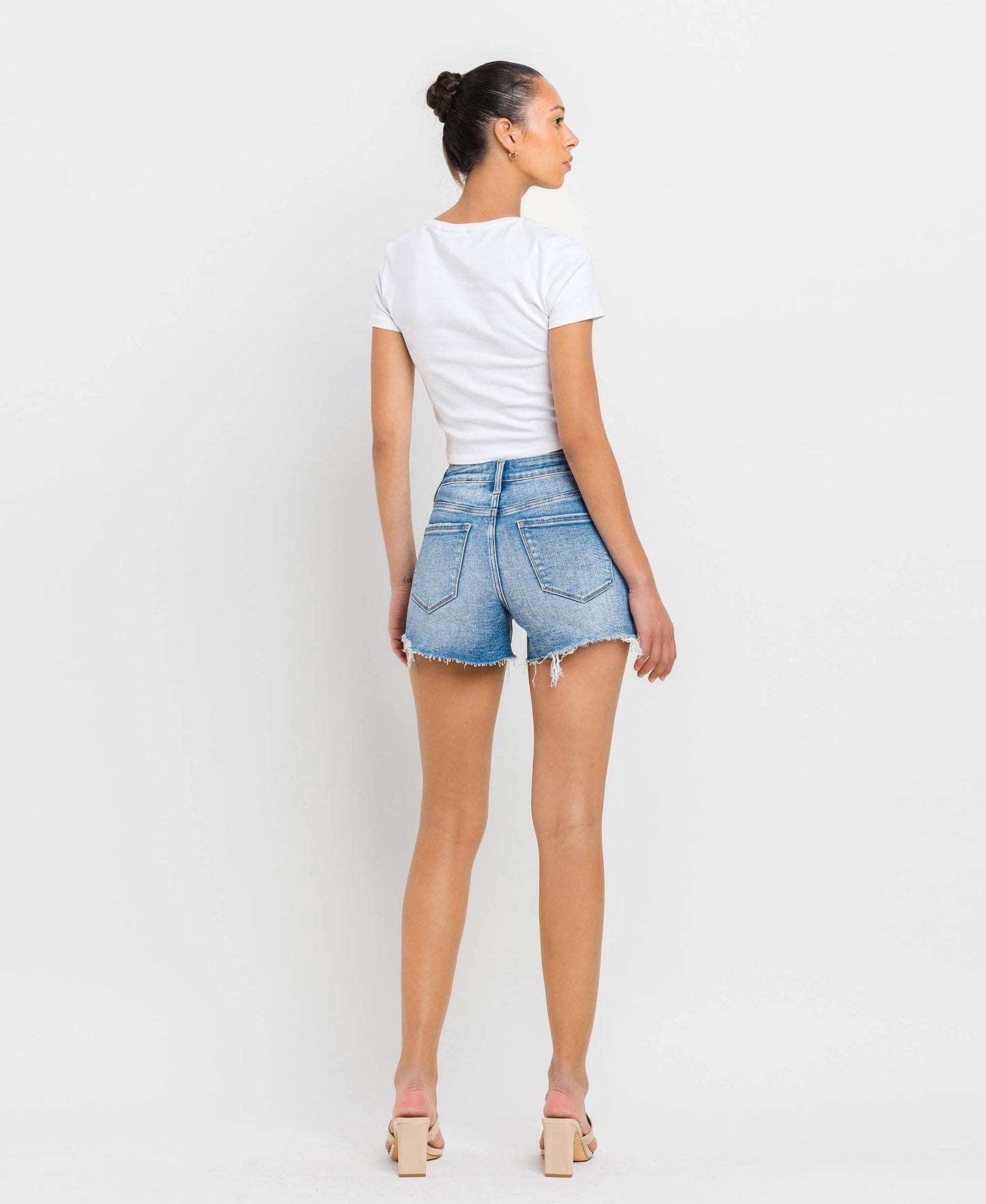 THE ANNA-HIGH RISE DISTRESSED CRISS CROSS SHORTS