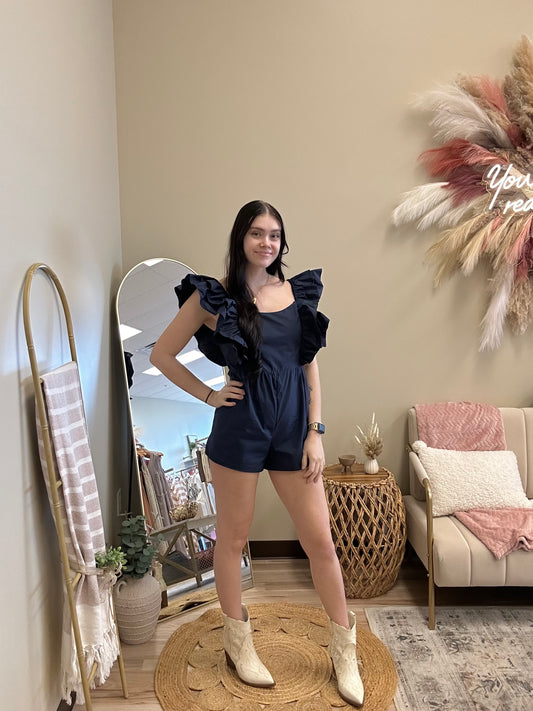 UP YOUR GAME NAVY RUFFLE ROMPER
